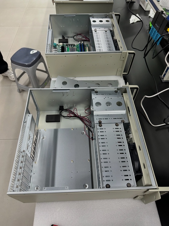 Coffee machine housing with internal parts scattered on a workbench
